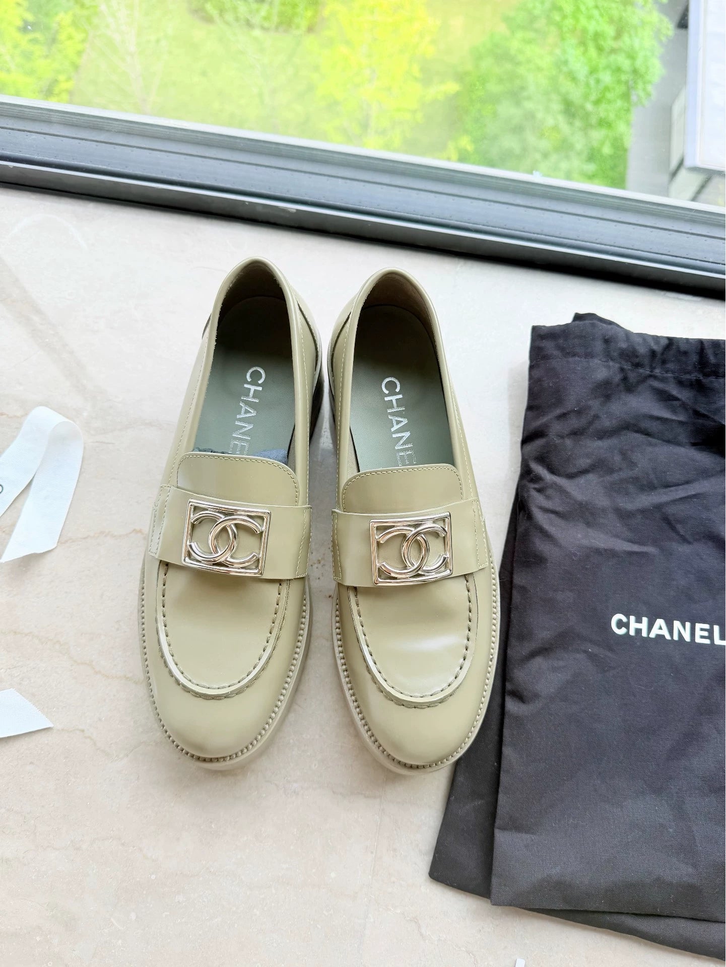 Chanel 23k olive green loafers