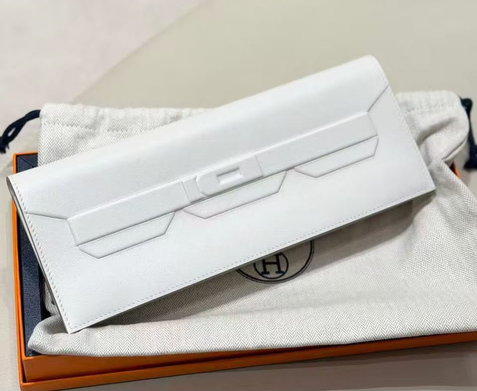 Hermes Kelly Pochette shadow in Gris pale