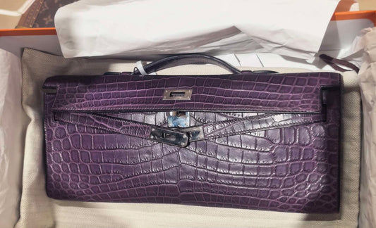 Hermès Kelly Cut clutch in deep purple matte crocodile leather with palladium hardware and short top handle