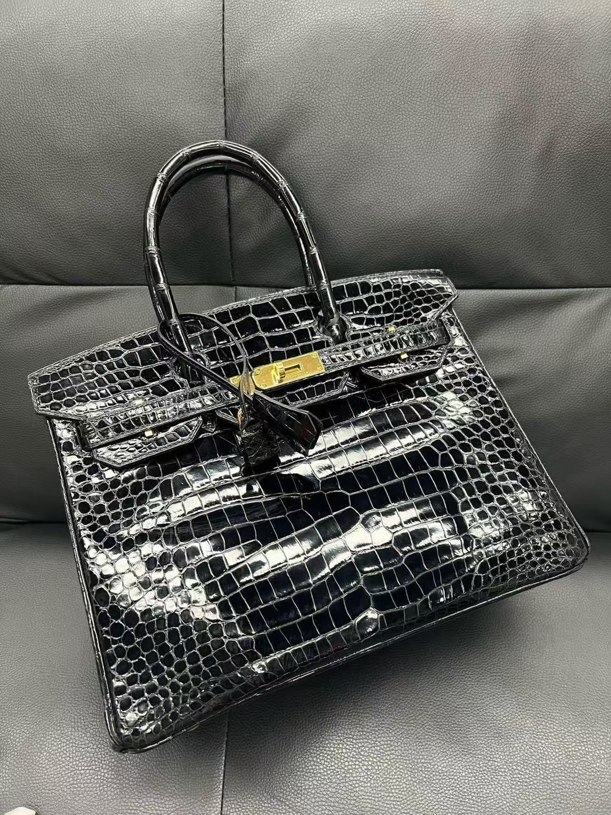Hermes Birkin 30 Black Shiny Porosus Gold hardware