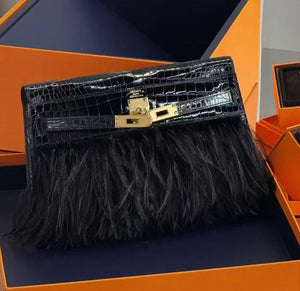 Hermes Kelly elan folie shiny black porosus gold hardware