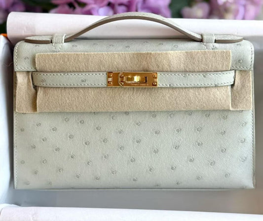 Hermes Kelly pochette Gris Perle Ostrich Gold hardware