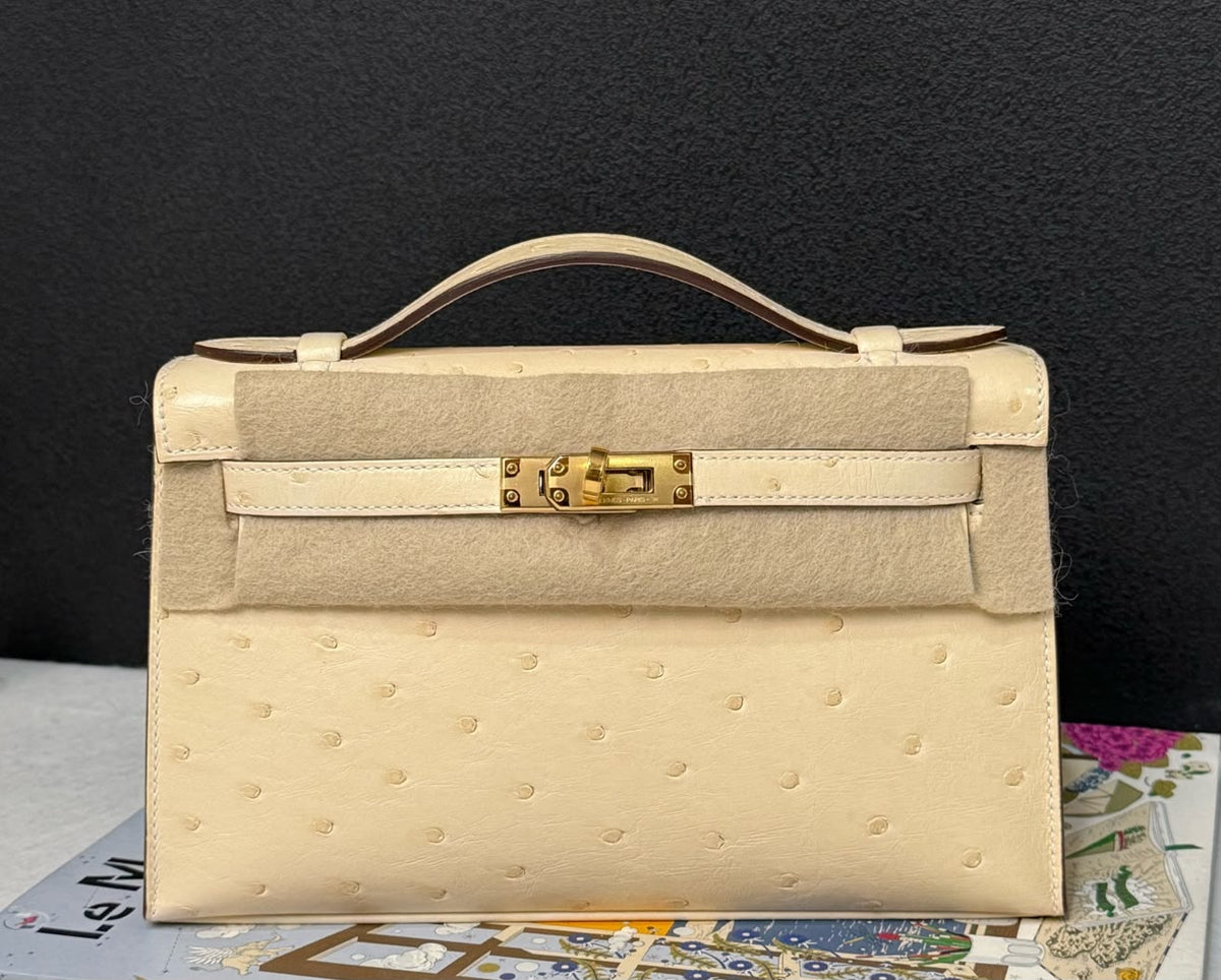 Hermes Kelly pochette vanilla ostrich gold hardware