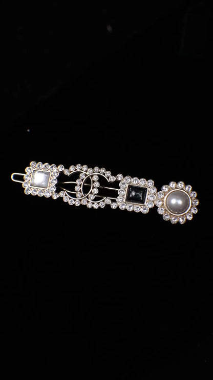 Chanel 21K black and white glass CC hair clip