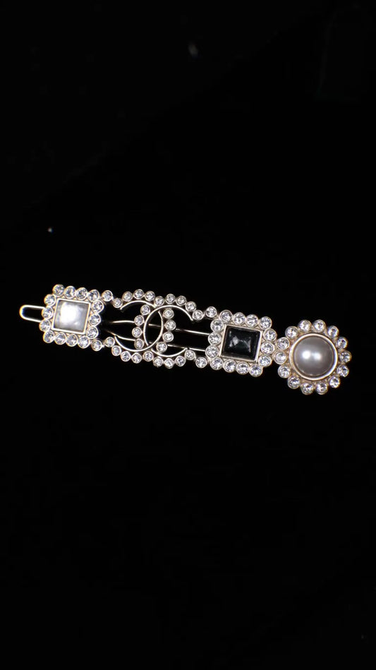Chanel 21K black and white glass CC hair clip