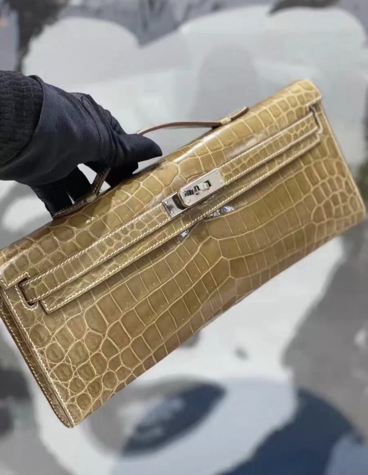 Hermes Kelly cut Tabac Shiny Niloticus Palladium hardware