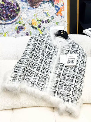 Chanel 25S black and white tweed jacket