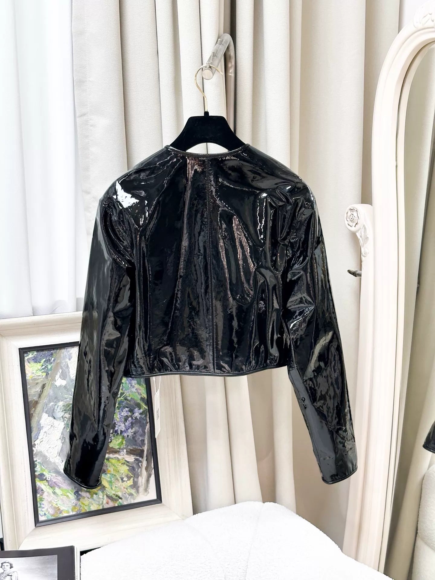 Chanel 23K black leather camellia jacket