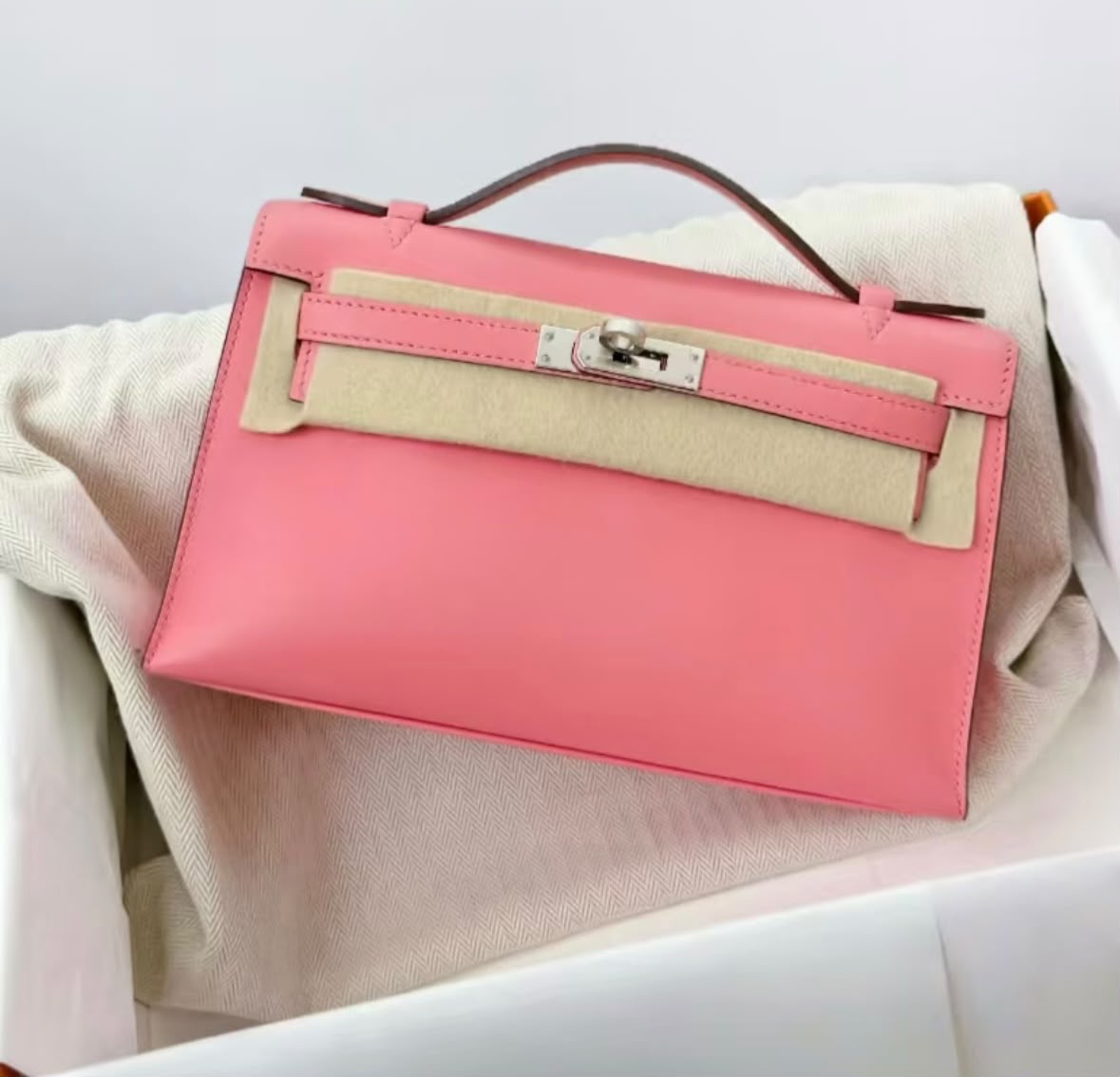 Hermes Kelly pochette Rose Ete Swift Palladium hardware