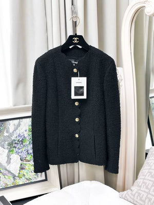 Chanel 20k black tweed jacket