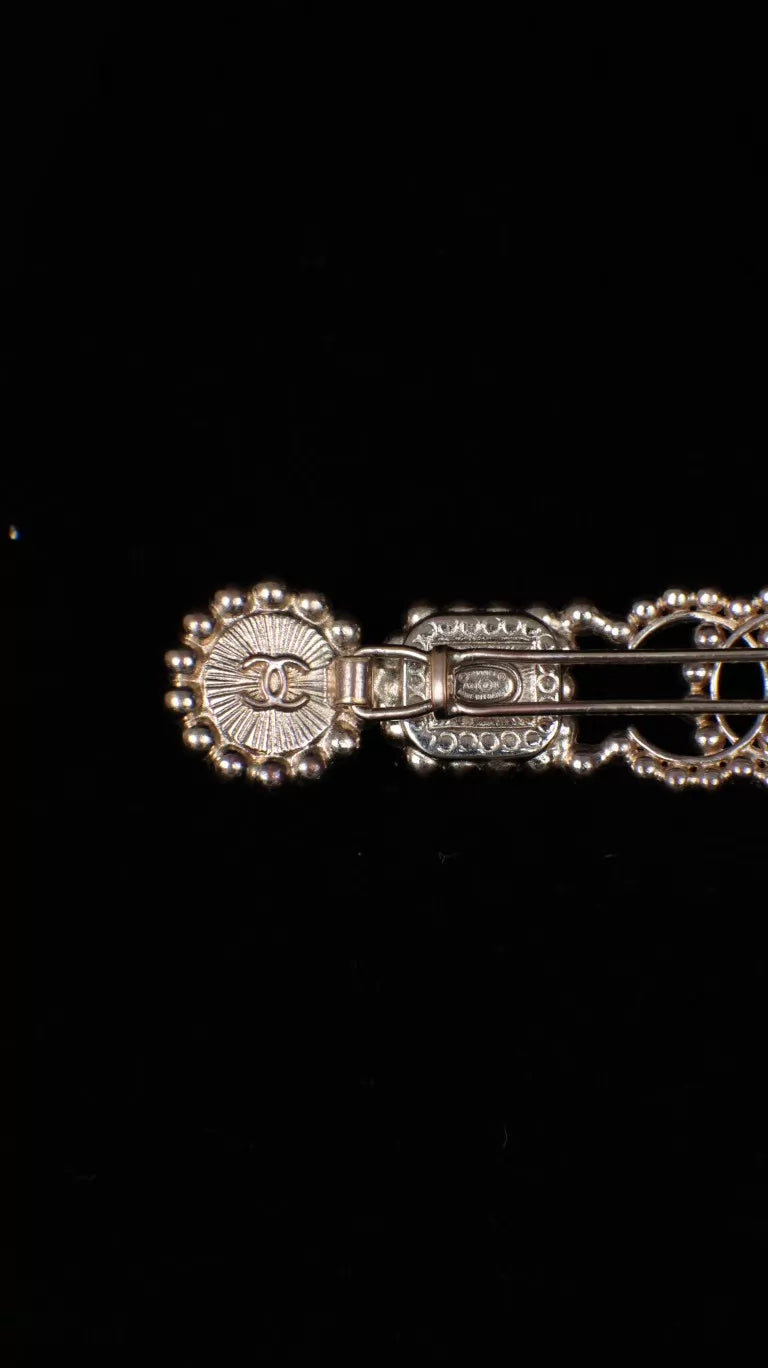 Chanel 21K black and white glass CC hair clip