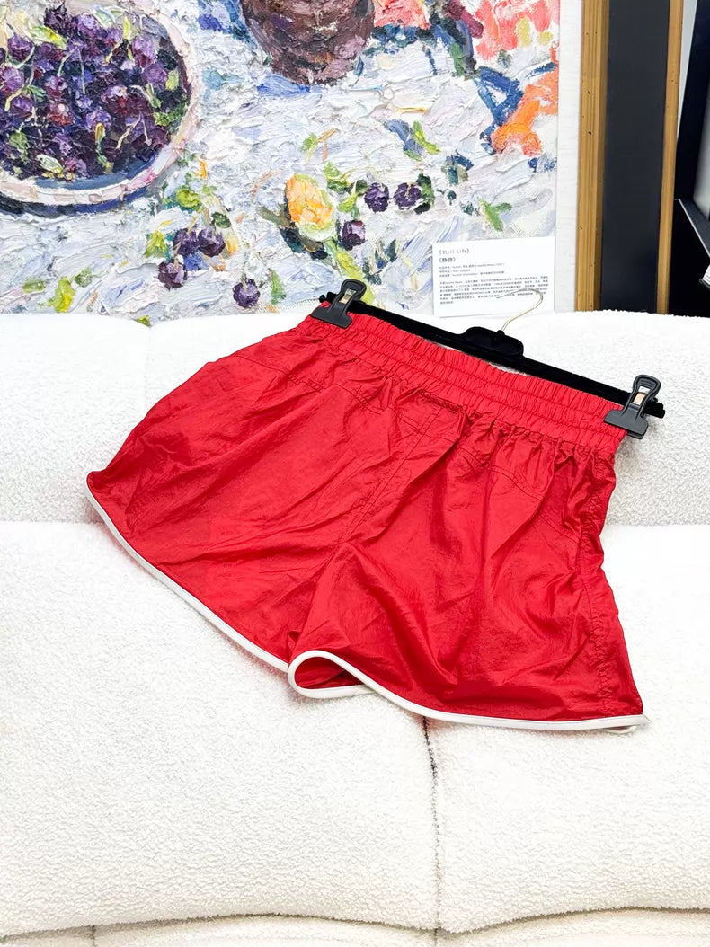Chanel 26M red shorts