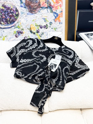 Chanel 25M black floral top