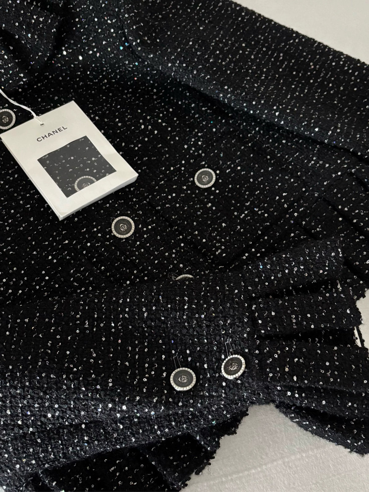Chanel 25A Black Sequined Ruffled Jacket