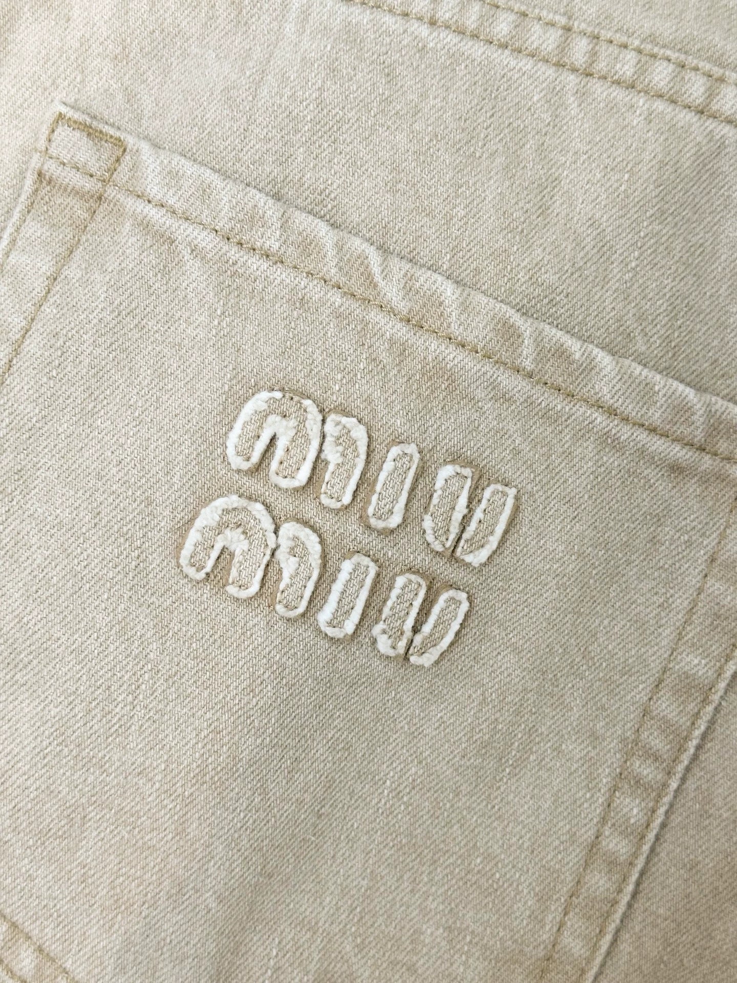 Miu Miu light khaki jeans