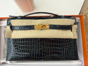 Hermes Kelly pochette vert Rousseau Shiny Porosus Gold hardware