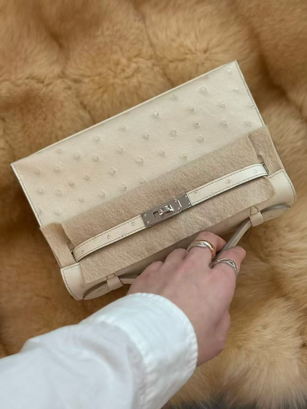 Hermes Kelly pochette Craie Ostrich Palladium hardware