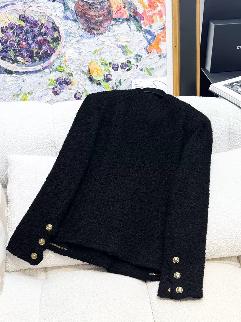 Chanel 20k black tweed jacket