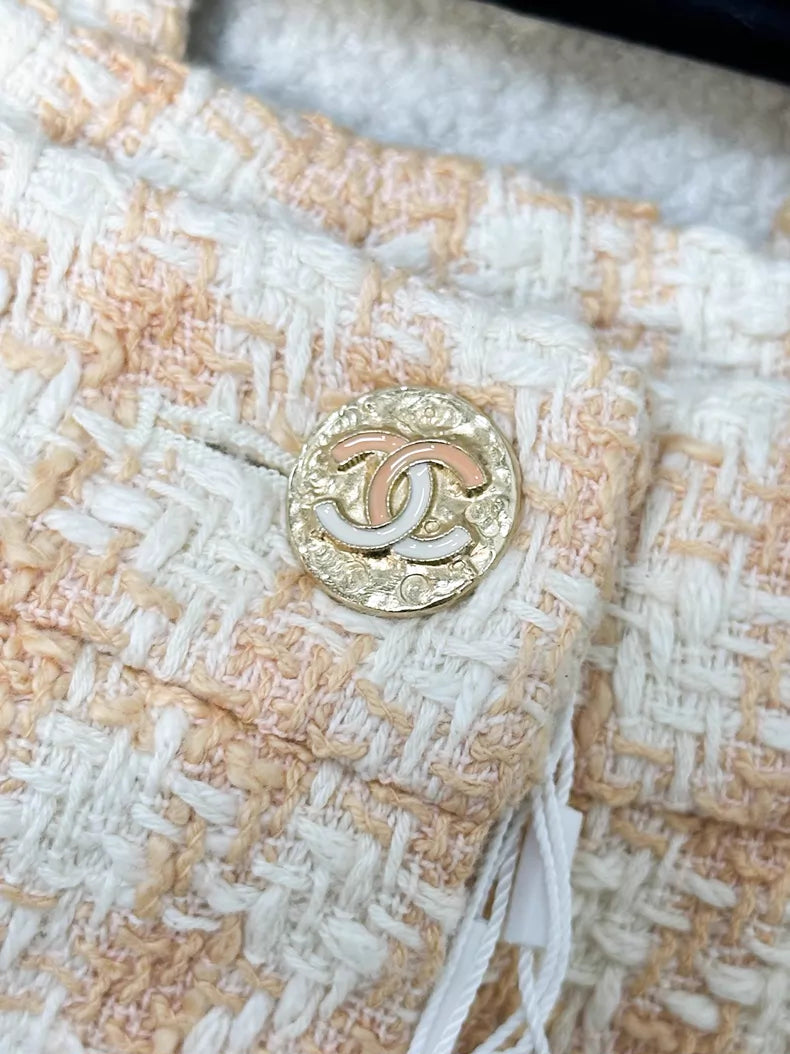Chanel 23S orange tweed trousers