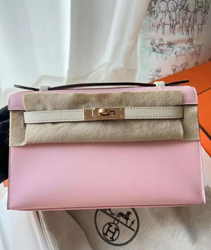 Hermes Kelly pochette Rose Sakura / Craie Swift Permabrass hardware