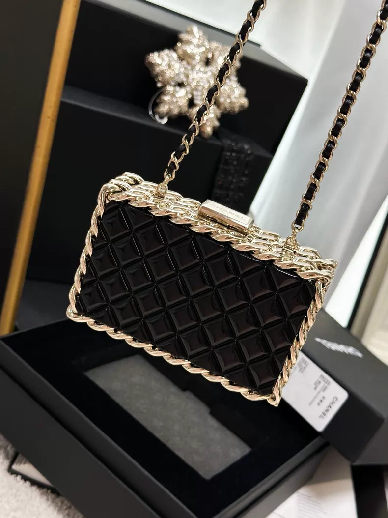 Chanel 22C black and gold acrylic bag