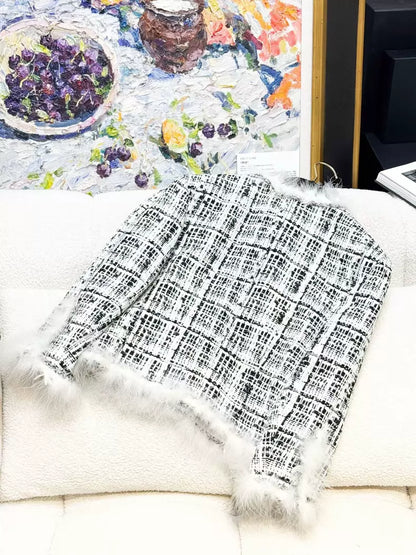 Chanel 25S black and white tweed jacket