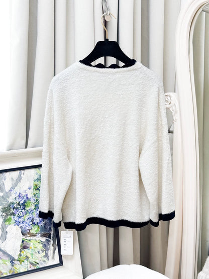 Chanel 26C black and white cardigan