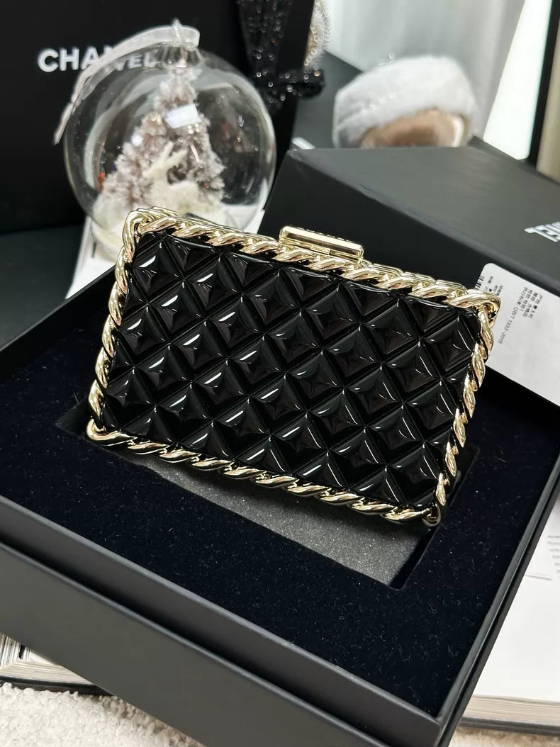 Chanel 22C black and gold acrylic bag