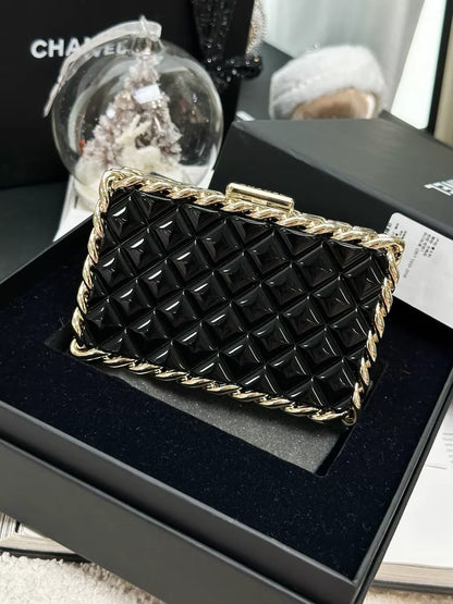Chanel 22C black and gold acrylic bag