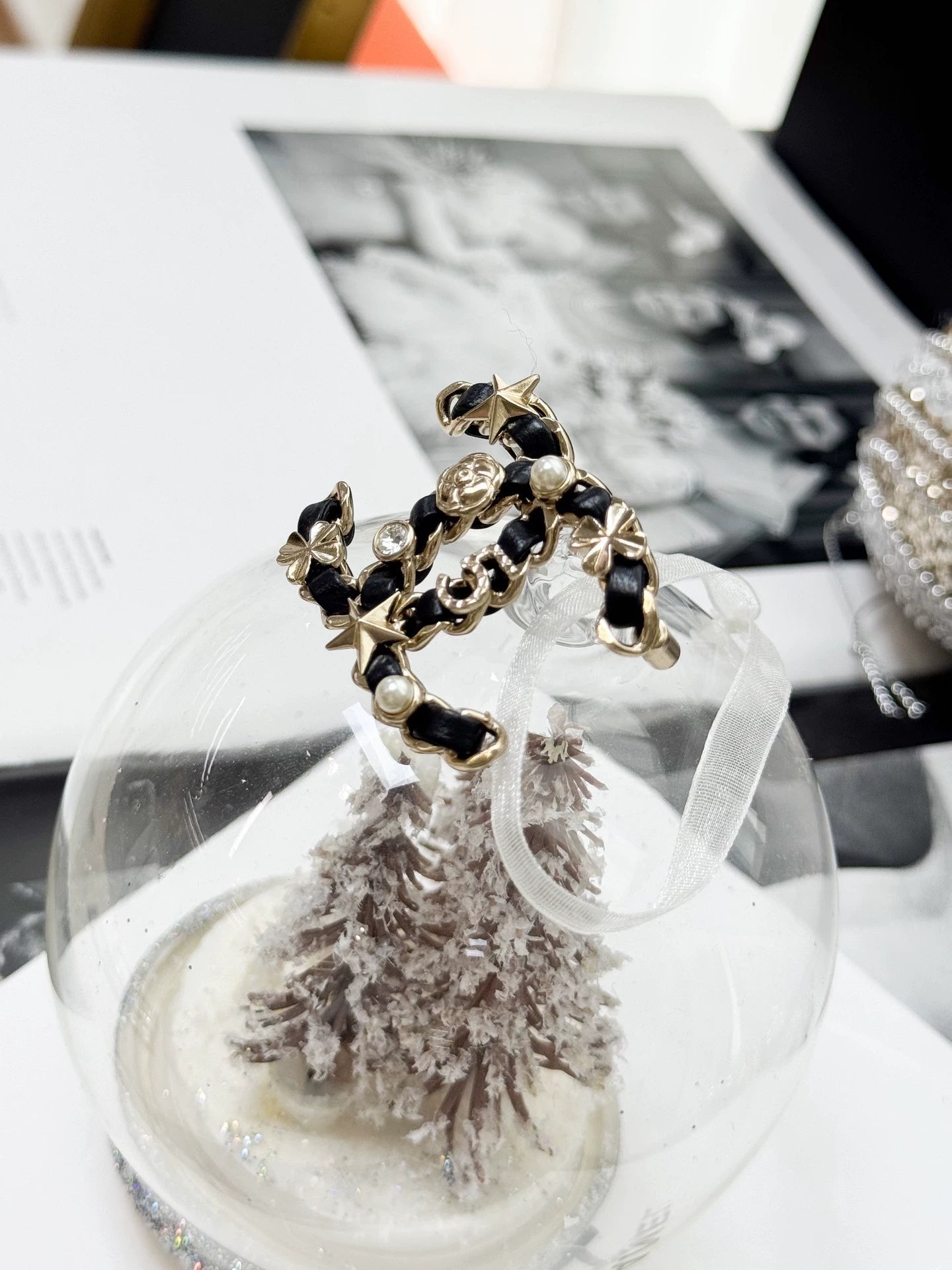 Chanel 20B Double C leather-threaded chain brooch