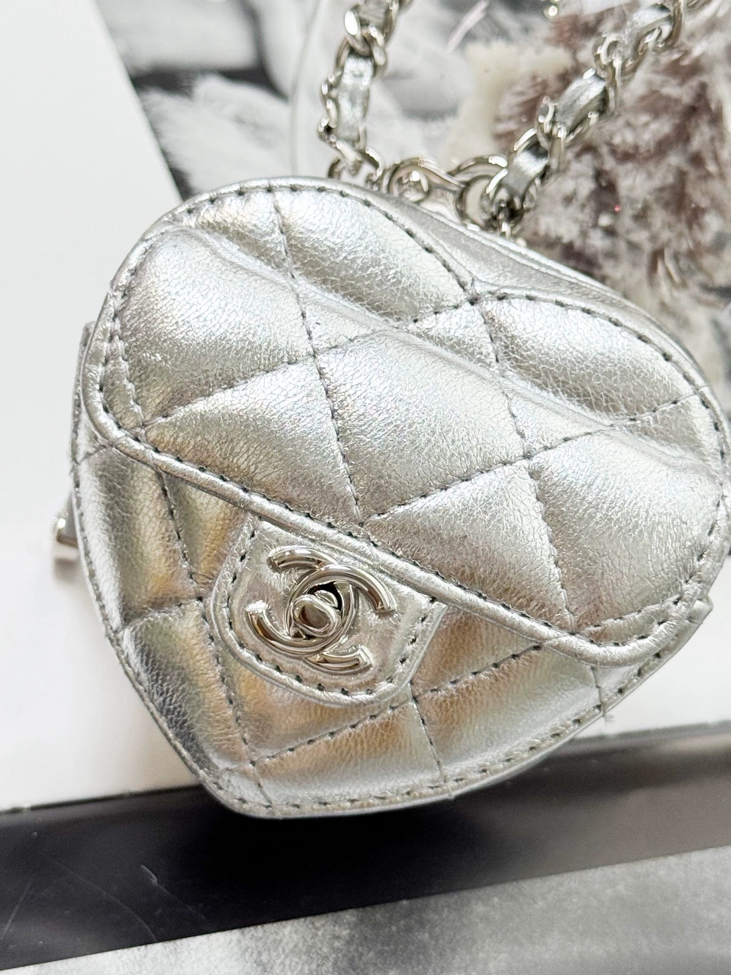 Chanel 25B Silver mini heart-patterned bag