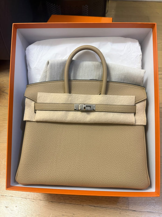 Hermès Birkin handbag in taupe grained leather with palladium hardware, single rolled top handle and belted flap closure