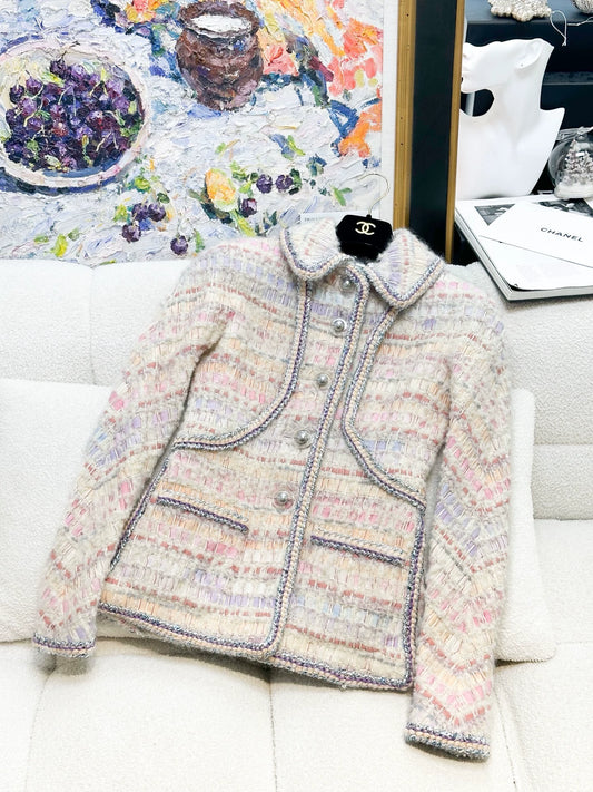 Chanel 17K mauve-pink mixed-color tweed jacket + skirt.