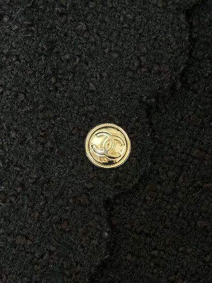 Chanel 20k black tweed jacket