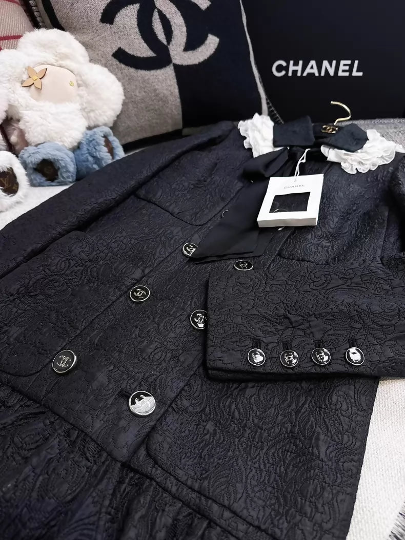 Chanel 21A Black Embossed Long Coat with Ruffled Collar