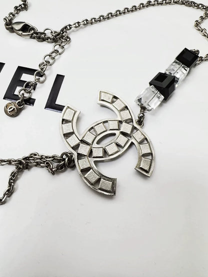 Chanel double C waist chain in black and white glass
