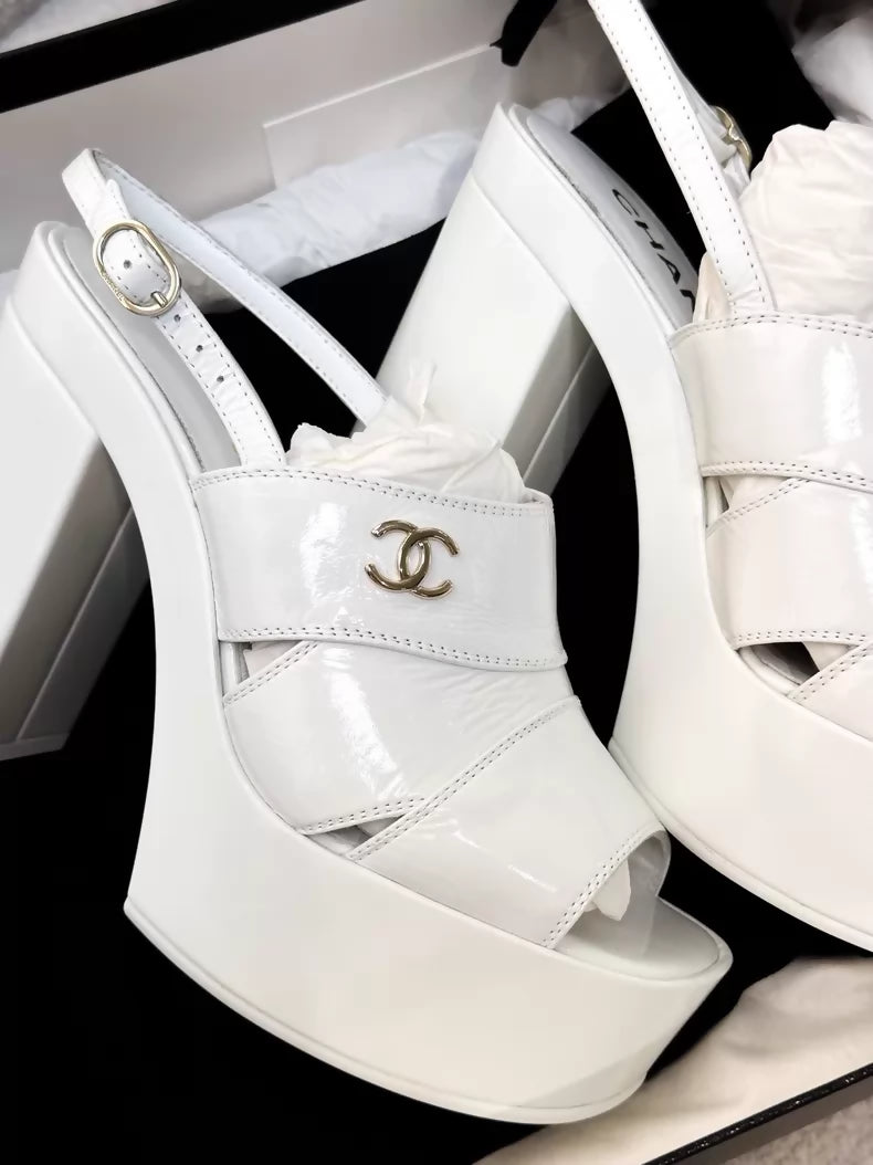 Chanel 23A white patent leather platform pumps