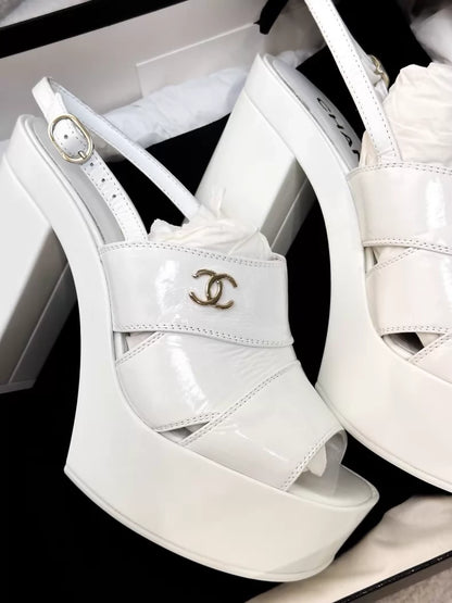 Chanel 23A white patent leather platform pumps