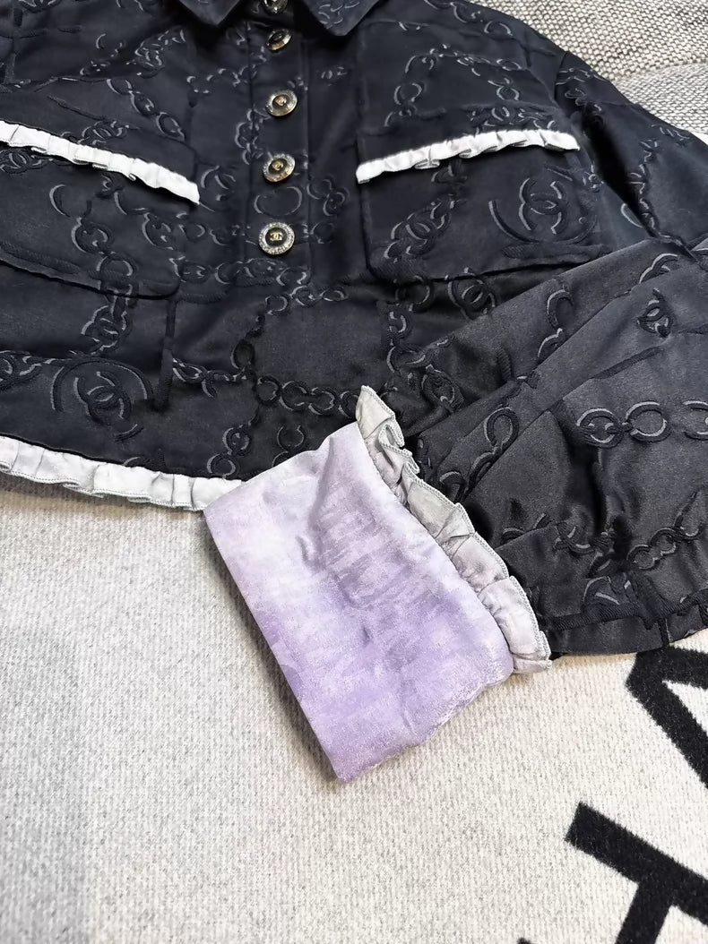 Chanel 22s black embossed double C logo jacket with purple gradient silk trim and two pockets