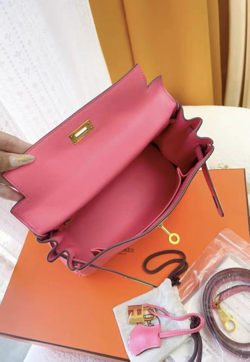 Hermes Kelly 25 pink Swift leather gold hardware