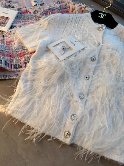 Chanel 25s white feather cardigan