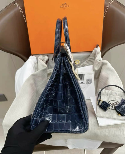 Hermès Birkin 25 Bleu Baltique (8X) Shiny Niloticus Crocodile with Gold Hardware