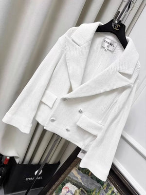 Chanel 21C white tweed jacket with rhinestone buttons