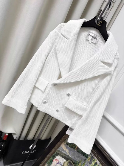 Chanel 21C white tweed jacket with rhinestone buttons