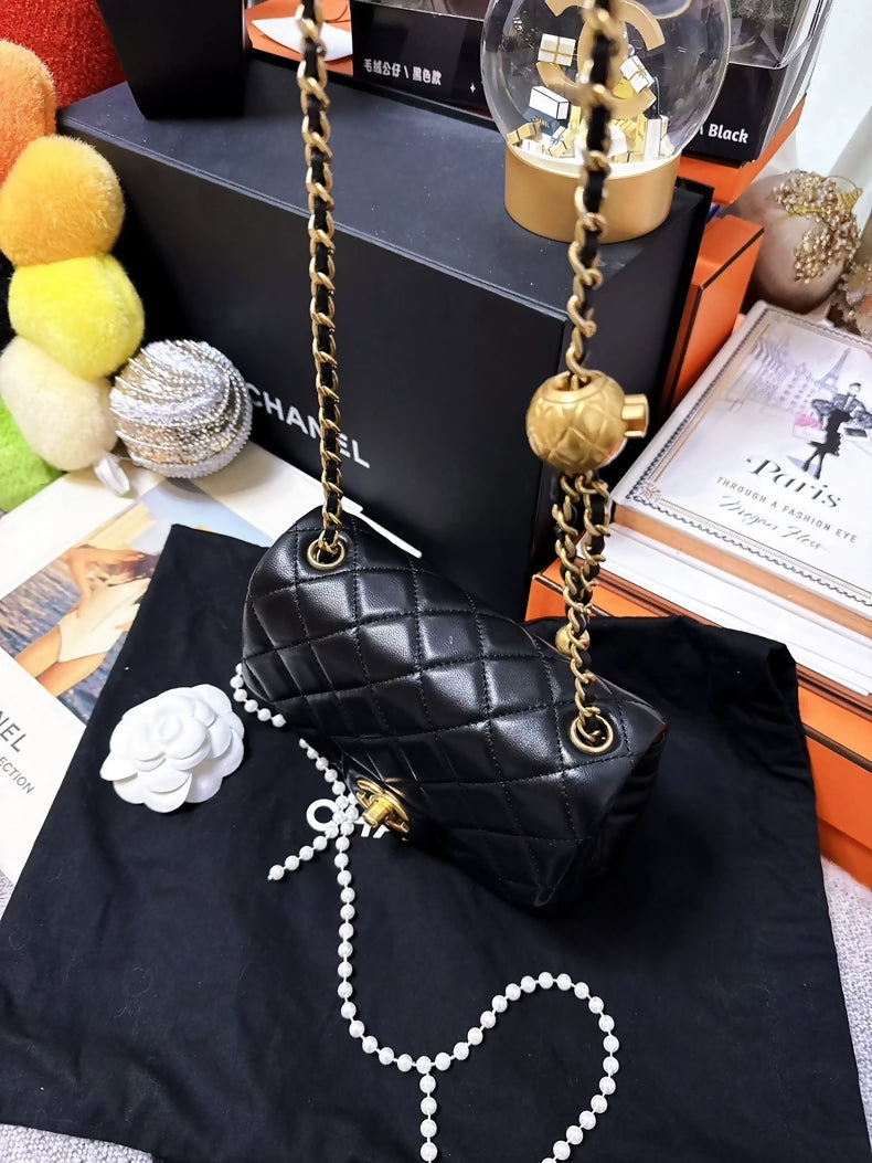 CHANEL 21b classic black and gold ball square bag