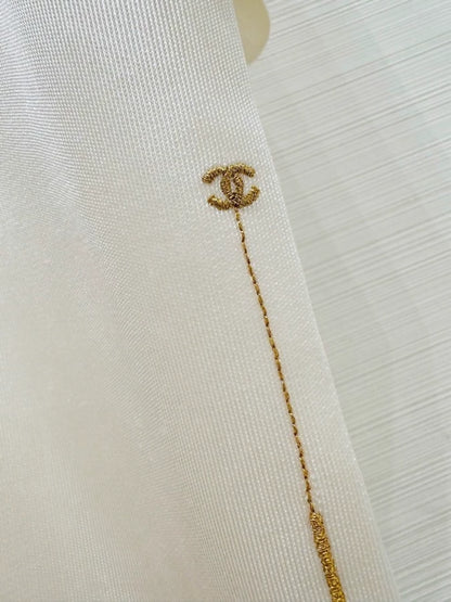Chanel 26A gold-embroidered crew neck knit short-sleeved top, F42,