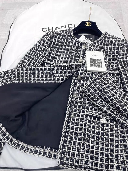 Chanel 25C black and white checkered tweed jacket