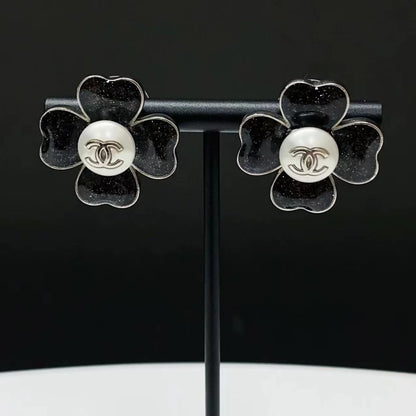 Chanel 2022 black resin four-leaf clover earrings
