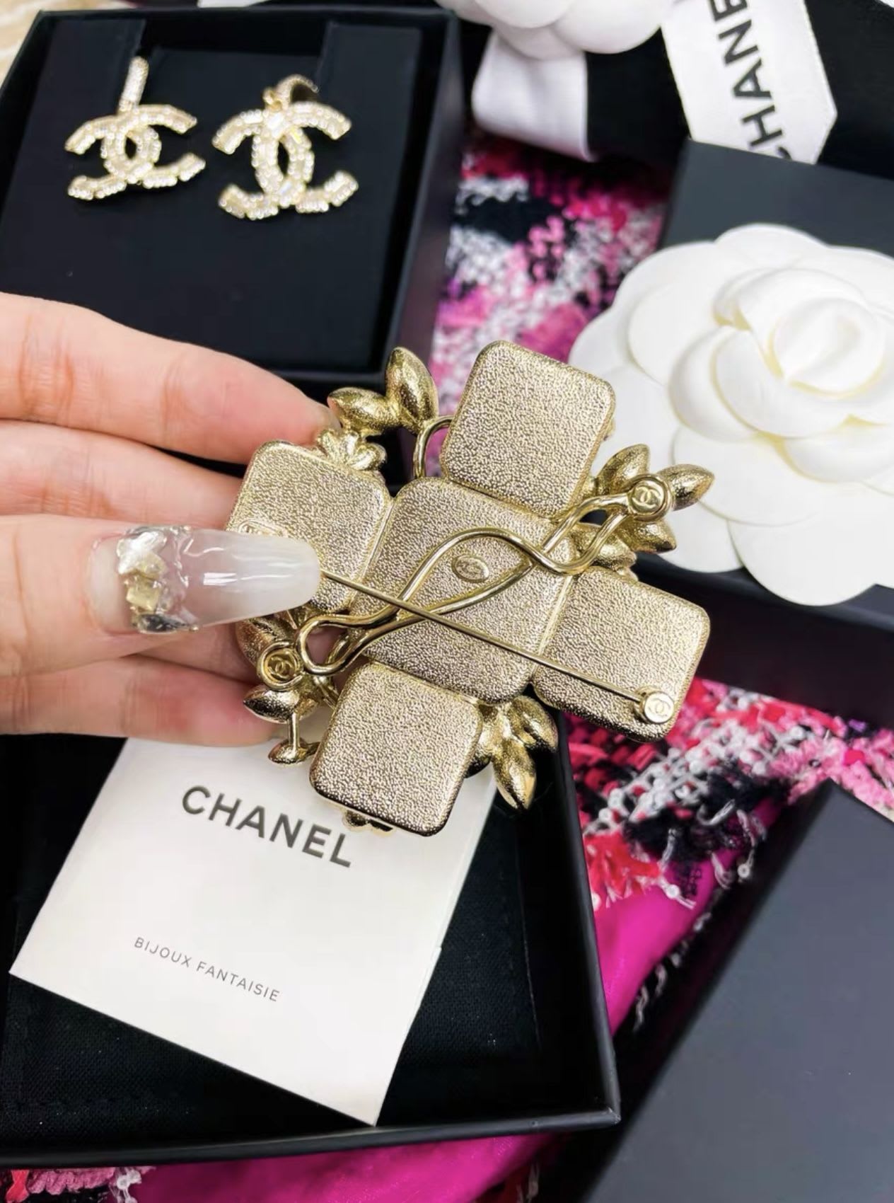 Chanel 22 flower cross brooch