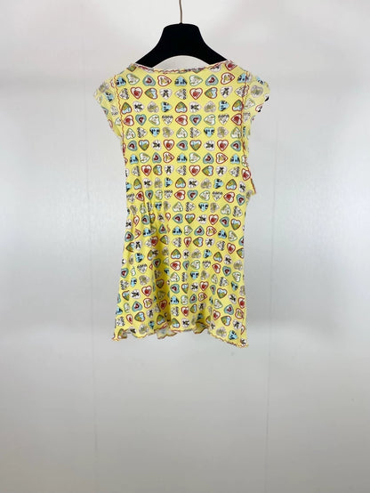 Chanel 06P yellow top with ruffled trim